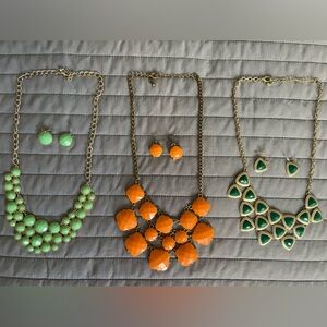 3 pairs of statement necklace with matching earrings
